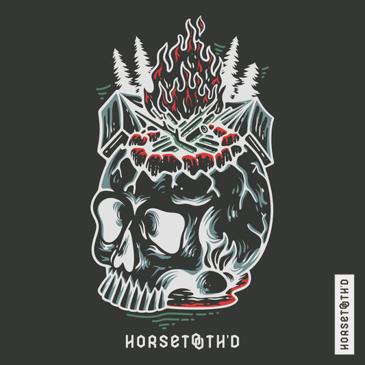 T-shirt featuring a unique design of a flaming skull against a camping scene, designed by Horsetooth'd.